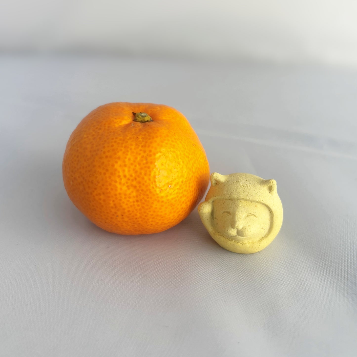 招き猫だるま｜みかん皮